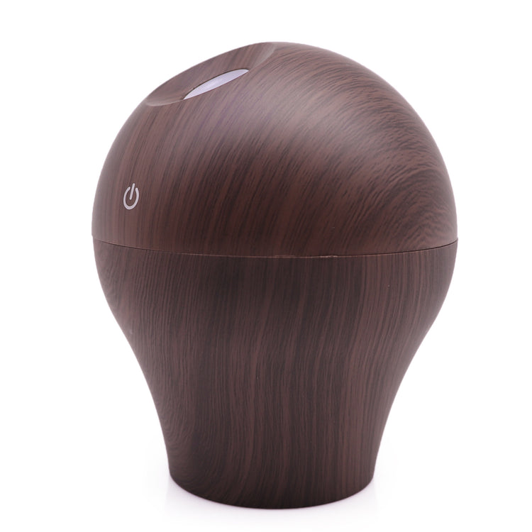 Household aromatherapy humidifier in a wooden finish design, compact and stylish, perfect for home use.